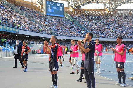 the genoa players under their fans at the end of the match during the Serie A 2021/22 match between SSC Napoli and FC Genoa Diago Armando Maradona Stadium