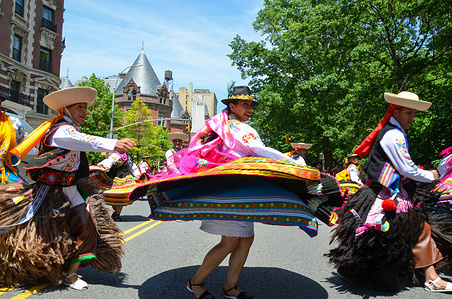 Participants march way up Central Park West in New York City during the annual Ecuadorian Independence Day Parade on May 29, 2022.