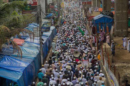Activists of Islami Andolan Bangladesh, an Islamist political party, participate in a procession to protest against former Indian BJP spokeswoman Nupur Sharma over her blasphemous comments on Prophet Mohammed in Dhaka on June 10, 2022.