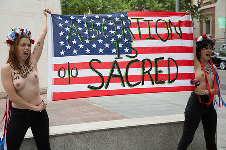 (EDITORS NOTE: Image contains nudity) FEMEN activists protest in favor of abortion at the US embassy in Madrid.