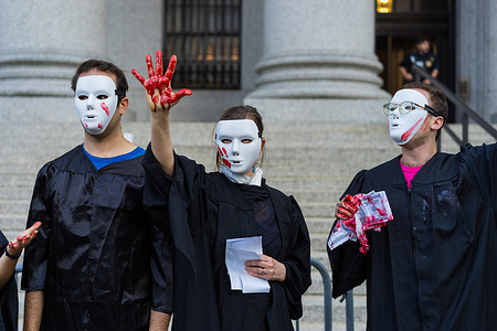 Climate activists held a protest at Foley Square and a demonstration at the Federal Courthouse in Manhattan after the Supreme Court's decision to limit the Environmental Protection Agency's ability to regulate the pollution by power plants.