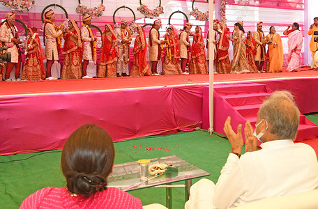 Rajasthan Chief Minister Ashok Gehlot blessed the brides and grooms for a happy married life at a mass marriage ceremony of 12 residents of Rajya Mahila Sadan organised by Department of Social Justice and Empowerment in Jaipur.