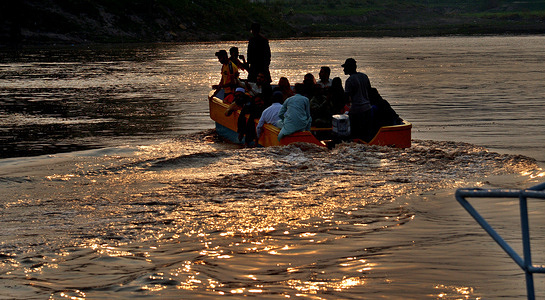 Pakistani people boating at river Ravi during Eid al Adha holidays in Lahore.