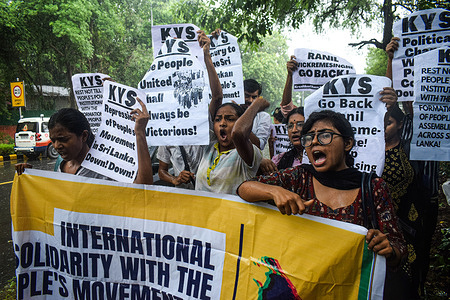 Student activists of Krantikari Yuva Sangathan (KYS) shout slogans outside the United Nations (UN) office in New Delhi, as they arrived to submit a memorandum against the arrest of Sri Lankan activists and raid on the main anti-government protest site.