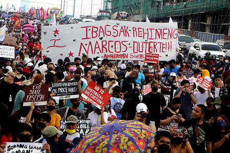 Multi sectoral groups march along Commonwealth Ave. from University of the Philippines Campus (Diliman) to conduct a protest march near Batasan Pambansa in Quezon City where Son of dictator President Ferdinand "Bong-Bomg Marcos Jr. will deliver his first State Of The Nation Adress (SONA) at House of Representative's on July 25, 2022.