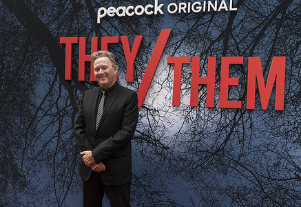 John Logan attends new York premiere of movie They/Them (Pronounced "They Slash Them") at Studio 525
