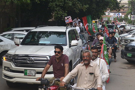 Supporters of former Pakistan's Prime Minister Imran Khan and political party Pakistan Tehreek e Insaf (PTI) stage protest during demonstrations against PMLN government and Election Commission in Lahore.