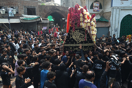 A large number of Pakistani Shiite Muslims worshipers participate in a religious central procession of Chehlum in Lahore. Chehlum to mark the end of the 40 day mourning period following the anniversary of the 7th century death of Imam Hussein (AS), the Prophet Muhammad's grandson and one of Shiite Islam's most beloved saints.