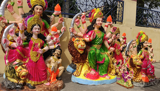 Idols of Goddess Durga for sale at a roadside shop ahead of Navratri Durga Puja festival in Beawar. The ten-day long Hindu festival Navratri begins on September 26. Devotees install clay idols at their home to worship Durga during this period.