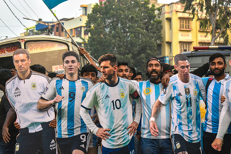 Members of the Argentina fan club display life-size cut out of Argentinas football team players during a rally to celebrate their win in the Qatar 2022 World Cup final football match between Argentina and France, in Kolkata.