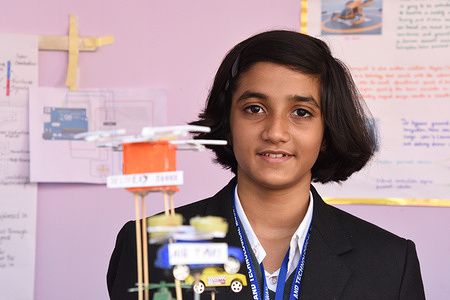 A school student showing her model at the 46th Eastern India Science Fair (EISF) along with 20th Science & Engineering Fair (SEF) that organized by the Birla Industrial & Technological Museum (BITM). Main theme of the fair (January 10-13, 2023) is 'Science and Technology for Sustainable Development'.