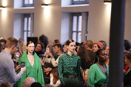 Berlin: Models present the latest collection by designer Marcel Ostertag and Peter Hahn on the catwalk in the Bolle Festsäle in Alt-Moabit.