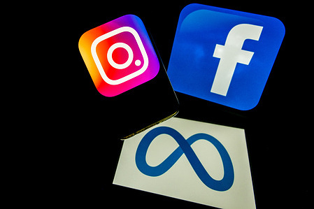 This photo illustration shows the logos of social media applications, Facebook and Instagram displayed on Personal Computers and Smartphones. Meta CEO Mark Zuckerberg announced on Sunday the launch of a paid subscription starting at $11.99 per month for users to authenticate their accounts on Meta platforms (Facebook, Instagram). The subscription will first roll out in Australia and New Zealand this week and resembles Twitter's model.
