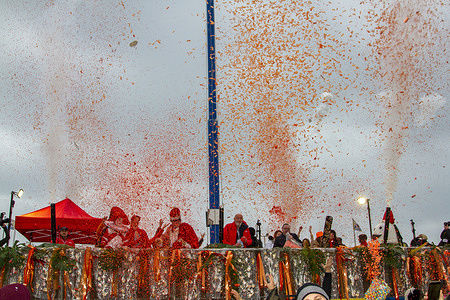 Final day of Viareggio carnival 2023, in Tuscany. Symbolic launch of orange confetti against gender-based violence
