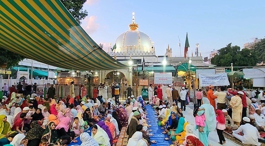 Muslims having Roza iftar on the first day of Ramadan in Dargah Khwaza Moinuddin Chishty.