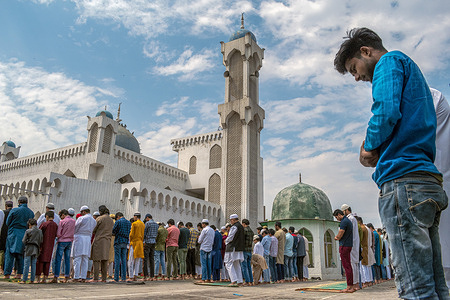 Muslim devotees offering the first Friday prayers of the holy month of Ramadan in the capital city of New Delhi.