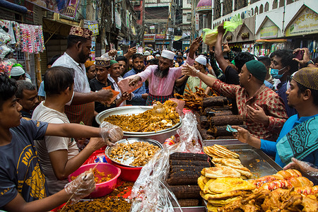 Bangladeshi vendors sell Iftar's items at Chawkbazar on the first day of the Muslim holy month of Ramadan. Every year a traditional Iftar market is open on this occasion for almost 400 years in Old Dhaka.