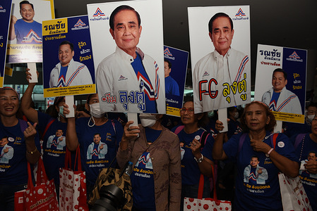 Supporters of United Thai Nation Party, rally listen to the campaign and unveil United Thai Nation Party candidates for the House of Representatives at IMPACT Exhibition and Convention Center, Pakkred District, Nonthaburi province (Bangkok greater) on March 25, 2023.