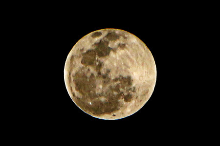 A full moon seen from Antipolo City, Philippines. The Full Moon in April is named the Pink Moon after the pink flowers that bloom in spring. Other names are Breaking Ice Moon, Budding Moon, Awakening Moon, Egg Moon, and Paschal Moon.