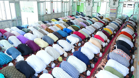 Indian muslim devotees offer 'Zuhr' (afternoon) namaz on the first friday during the holy month of Ramadan, at Jama Mosque in Beawar. Ramadan, also known as Ramzan, Ramazan or Ramzaan, is the holiest month in Islam and the ninth month of the Islamic calendar which is celebrated by Muslims with much pomp and grandeur. During this period, Muslims abstain from eating, drinking, smoking, and evil thoughts and action from dawn until sunset as they observe a fast between dawn and sunset and then break it with family and friends coming together and eating a meal called iftar.