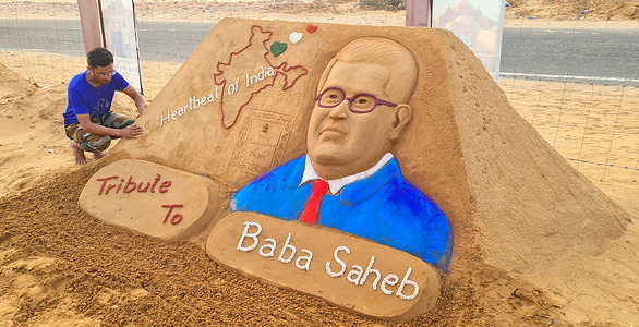 Indian sand artist Ajay Rawat creates a sand sculpture of Babasaheb Bhimrao Ambedkar on the eve of his birth anniversary in Pushkar. Ambedkar Jayanti is celebrated on April 14 to mark the birth anniversary of Dr. Bhimrao Ambedkar, who is also remembered as the 'Father of the Indian Constitution'. Ambedkar was an Indian jurist, economist, politician and social reformer who inspired the Dalit Buddhist Movement.