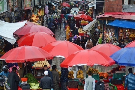 Amid Heavy Rainfall Kashmiri Muslim do shopping ahead of Eid Al-Fitr at Lal chowk district, Srinagar the Summer captial of Indian Administrated Kashmir on April 19, 2023. Muslims around the world celebrate Eid al-Fitr, the three day festival marking the end of the Muslim holy fasting month of Ramadan, which is one of the two major holidays in Islam.