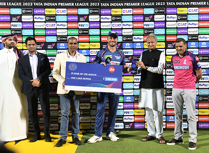 Rajasthan Chief Minister Ashok Gehlot presents player of the match award to Marcus Stoinis after the Indian Premier League (IPL) Twenty20 cricket match between Lucknow Super Giants and Rajasthan Royals at the Sawai Mansingh Stadium in Jaipur.