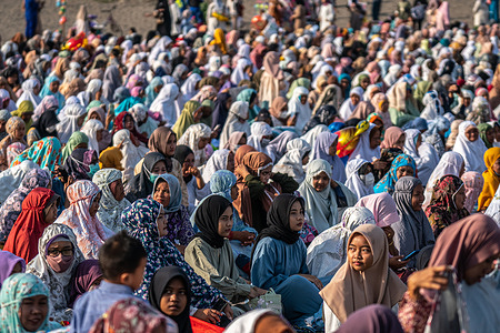 Indonesian Muslims attend Eid al-Fitr prayer on the 'sea of sands' at Parangkusumo Beach in Bantul, Yogyakarta, Indonesia on April 21, 2023. Muslims around the world celebrate Eid al-Fitr with their families which marks the end of Ramadan.