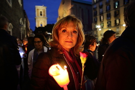Doctors attending a candlelight procession in memory of their colleague Barbara Capovani, killed in Pisa by a former patient of the psychiatry department.
