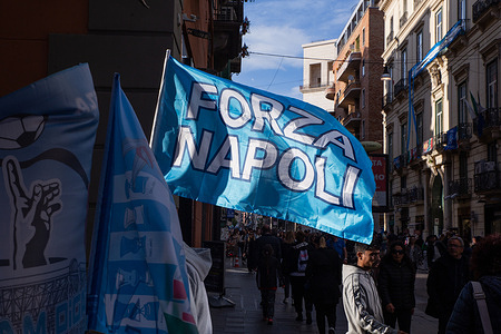 A flag of the SSC Napoli flies in Via Toledo in Naples
