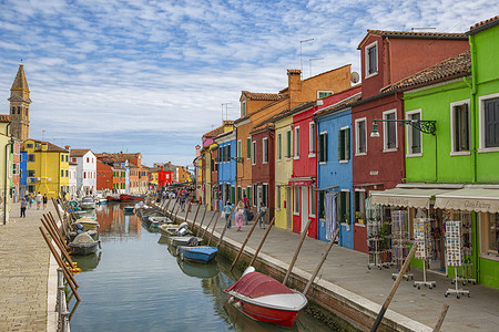 Burano is a small island in the Venice lagoon, famous for its Lace and its colorful houses.