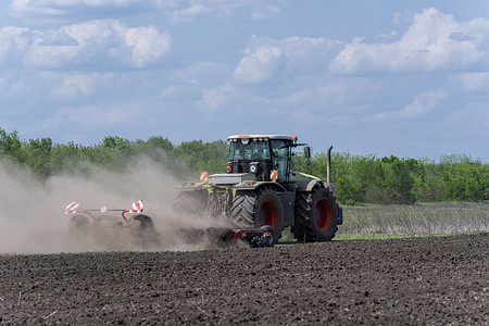 Recently de-mined field is plowed for planting at farm Pershe Travnia of village Velyka Oleksandrivka of Kherson region seen after liberation from Russian invasion. The farm was producing grain (wheat, barley, sunflower), meat (pork), and other products; with 100 employees and more than 3,000 hectares of fields, more than 1200 pigs. The farm was completely destroyed, all equipment, harvest from 2021, fertilizer, all buildings including storages for grain and places where pigs were kept and fed. After bombing pigs were either burned alive, some in panic jumped into the well. Serhiy Kosyuk estimates that the cost of rebuilding from scratch will be at least 1 million Euros.