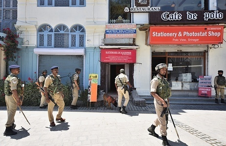 Indian paramilitary troopers stand guard in the city center ahead of the G20 summit on May 21, 2023 in Srinagar, Indian administered Kashmir, India. The Group of Twenty (G20) is the premier forum for economic cooperation worldwide. All major international economic issues are influenced and strengthened by it. On May 22-24, the Kashmir Valley will host the third G20 tourism working group meeting under India's presidency. After the India revoked Indian-administered Kashmir's special autonomy status in August of 2019, the meeting will be the first major international event in the disputed region since then. By hosting the meeting in Srinagar, India is likely highlighting its rich geographic diversity.
