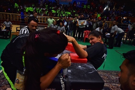Athletes compete during the 45rd National Arm Wrestling Championship held In Srinagar the Summer captial of Indian Administrated Kashmir on May 25, 2023.