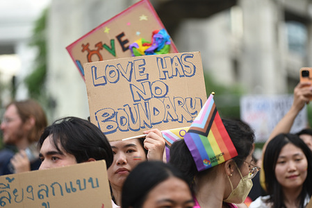 People march with placards and Rainbow flag join event "Bangkok Pride 2023" event, on June 4, 2023. with participants marching, from The Pathumwan intersection, Rama 1 Road to Ratchaprasong intersection before entering the CentralWorld.