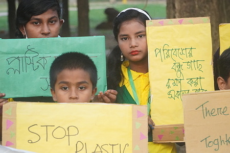 Students take part in an event that celebrates World Environmental Day in Suhrawardy Udyan Park.