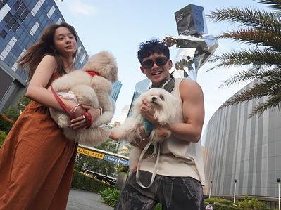 Fur parents together with their fur babies strikes a pose at the iconic Timeman statue in SM Megamall to participate #MEGAPUPSTAR contest which will run from June 5 to June 30, 2023. The winner will be featured on the 3D LED billboard of SM Megamall in Mandaluyong City.