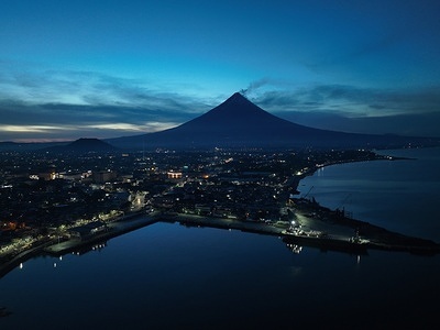 Sunset at Mt. Mayon volcano on June 13, 2023 in Legaspi City, Philippines. Around 15,000 people have left their homes which is within the 6-kilometer (3.7-mile) danger zone radius of Mayon since volcanic activity lava flow, ash fall and sulfuric gas emission increased since last week.