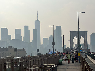 The New York City skyline is covered again with smoke due to Canadian wildfires.