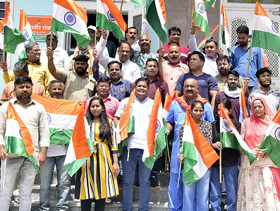 Members of Ram Lal Suraj Devi Ranka Trust distribute 21,000 flags to create awareness of Har Ghar Tiranga campaign ahead of the 76th Independence Day. Har Ghar Tiranga aims to encourage every household to actively participate by hoisting the Indian flag on their premises from August 13th to August 15th.