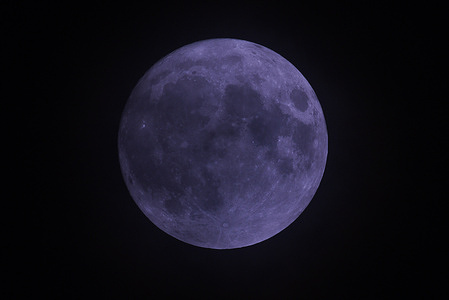 A super blue moon appears in the sky above Kolkata.