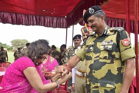 Social worker Meena Asopa ties ‘Rakhi’ on the wrist of DIG BSF Pushpendra Singh on the occasion of ‘Raksha Bandhan’.