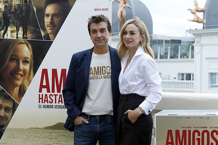 The Spanish actor theater, television and film actor, Javier Veiga (L), known for his work as presenter of the Comedy Club on Canal+ and the Spanish actress, Marta Hazas (R), know for her performance in the series 'El internado' or 'Velvet', are seen on Tuesday, September 12, 2023, while posing for the media during the presentation of the film 'Amigos hasta la muerte' (by its title in Spanish), directorial debut of actor, in Madrid (Spain). 'Amigos hasta la muerte' will be released in theaters on September 22, after its successful run at several festivals. This dramatic comedy of Spanish-Mexican production revolves around the limits of friendship, each person's priorities when life puts you to the test, and how little the things that seemed important before suddenly matter.