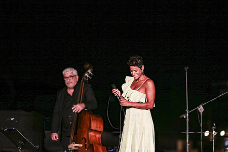 Walter Ricci Trio and Karima at Jazz&Image at the Celio Park. Walter Ricci - piano and voice, Dario Rosciglione - double bass, Amedeo Ariano - drums with Karima, voice paid homage to Nat King Cole in the splendid setting of the Colosseum in Rome.