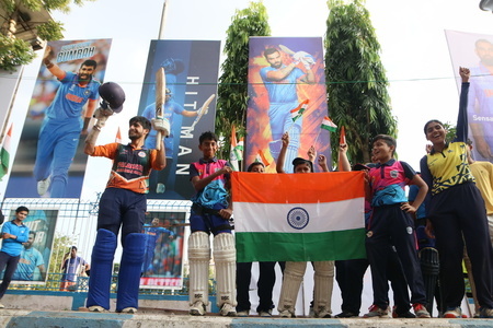 Budding Cricketers of Patuli Cricket Academy cheers for the Indian Team , A day before the ICC Men's Cricket World Cup 2023 final between India and Australia in kolkata,India on November 18,2023. Many Cricket fans offer special prayers for the Indian team and especially for their star player Virat Kohli.