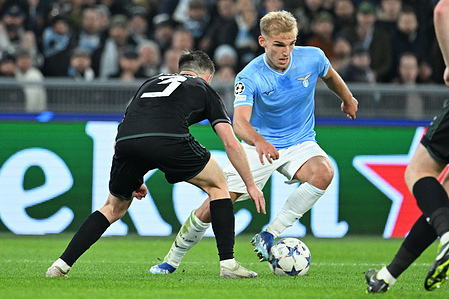 Gustav Isaksen of SS Lazio competes for the ball with Greg Taylor of Celtic FC during the Uefa Champions League between SS Lazio vs Celtic FC at Olimic Stadium on November 28, 2023 in Roma, italy