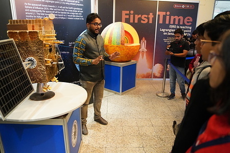Presentation of an exhibition featuring a model illustrating the orbit of Aditya-L1 around the Lagrange Point for school students.