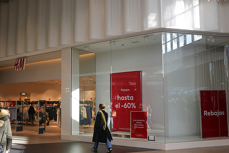 Paredes, Spain, January 07th, 2024: The entrance of the H&M store announcing sales up to 60% during January 2024 sales begin, on January 07, 2024, in Paredes, Spain.