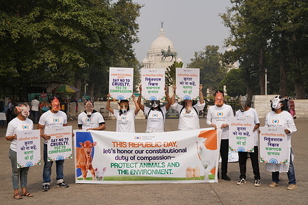 Volunteers adorned in animal masks gather at Victoria Memorial, holding placards that advocate for the choice of compassion over cruelty as a constitutional duty. This event, organized by the 'Mercy For Animals India Foundation,' serves as a prelude to Republic Day.