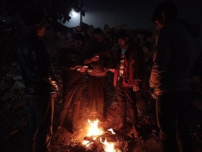 A total of 3/4 days of mild winter in the country including last 13 January, the worst affected by the winter are day laborers and common agriculturists and hence they are seen trying to protect themselves from the severity of winter. Burning fire by the side of the road at night.